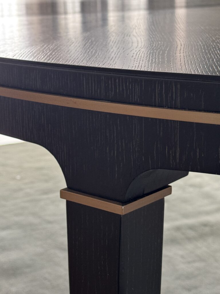 dark wood dining table acts as the anchor of the room design